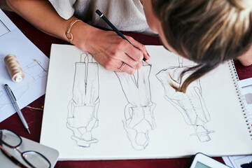 Woman, hands and fashion design drawing on paper for planning, idea or sketching on office desk above. Hand of creative female person, artist or graphic designer for clothing sketch ideas for startup - Powered by Adobe