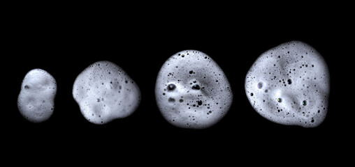 Include white liquid bubbles from soap or shampoo or shower gel. Abstract soap bubbles. Set foam, with clipping path texture and black background.