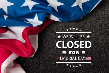 Fototapeta na wymiar Memorial Day Background Design. American flag on black textured background with a message. We will be Closed for Memorial Day.