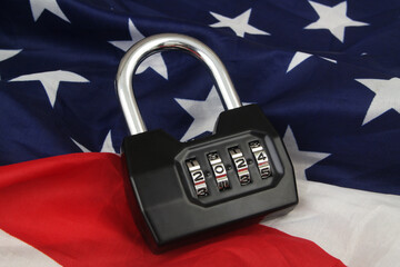 Black padlock with numbers 2024 on US flag. Election security and data protection in United States...