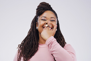 Portrait, funny face and finger on nose with a black woman in studio on a gray background looking silly or goofy. Comedy, comic and nostril with a crazy young female person joking for fun or humor - obrazy, fototapety, plakaty