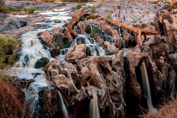 The Epupa Waterfall in Namibia is one of the highest waterfalls in Africa. The Epupa Waterfall is known for its stunning beauty and immense power, as well as the fact that it is a vital source of wate