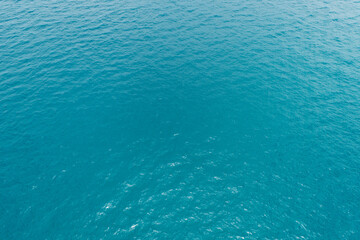 Sea surface aerial view,Bird eye view photo of waves and water surface texture,Amazing sea waves crashing on beach background,Beautiful nature landscape view sea ocean background