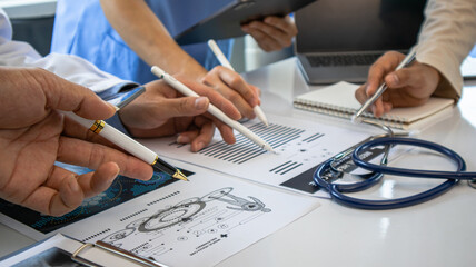 Medical team and business people use computers during office meetings.