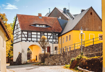 The old town of Altenberg. View of the old street near Lauenstein Castle - obrazy, fototapety, plakaty