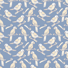 Birds' seamless pattern of parrots and nightingale birds on a baby blue background