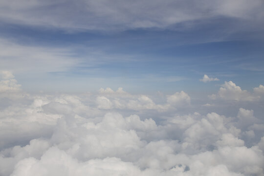 Abstract Blue Sky With Clouds As Seen From Above From Airplane