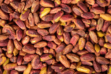 Pistachio. Pistachio kernel closeup food background. Top view. texture. copy space banner