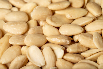 Almond. Peeled almonds closeup food background. texture. copy space banner