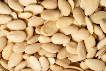 Almond. Peeled almonds closeup food background. Top view. texture. copy space banner