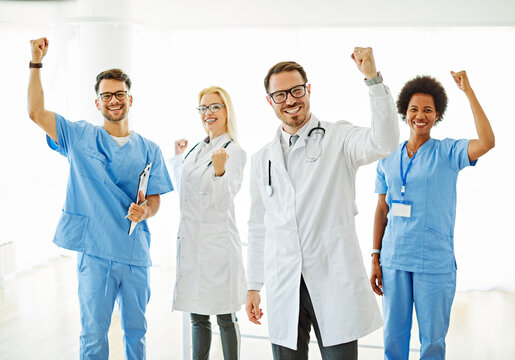 doctor hospital team medical nurse health medicine teamwork professional healthcare clinic group uniform happy smiling celebrating success victory partnership