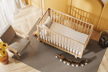 Fototapeta na wymiar Green baby room interior with crib and armchair, top view