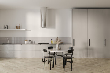 Cozy kitchen interior with dinner table, kitchenware and shelves