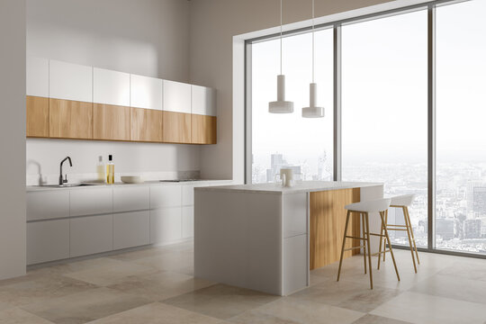 White and wooden kitchen corner with bar