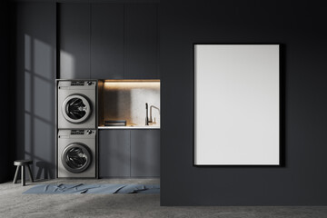 Grey laundry interior with washing machines, shelves and mock up frame - obrazy, fototapety, plakaty