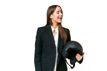 Young Asian woman with a motorcycle helmet over isolated chroma key background laughing in lateral position
