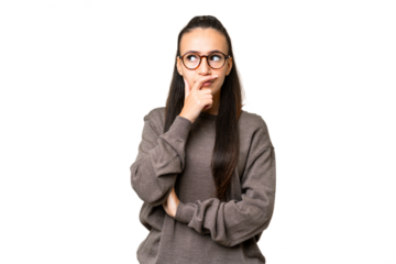 Young Arabian woman over isolated chroma key background having doubts and with confuse face expression