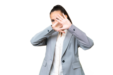 Young Arabian woman over isolated chroma key background nervous stretching hands to the front