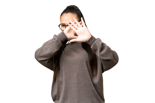 Young Arabian woman over isolated chroma key background nervous stretching hands to the front