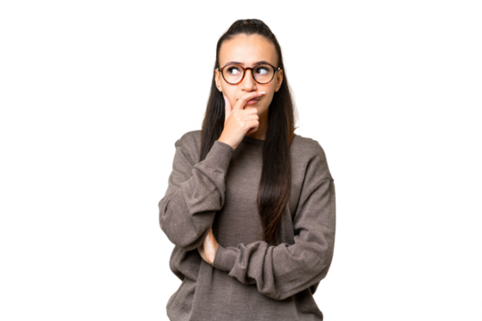 Young Arabian woman over isolated chroma key background having doubts and with confuse face expression