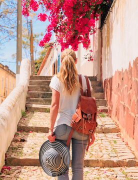 Traveler woman wwalking in Portuguese street- Algarve, Silves