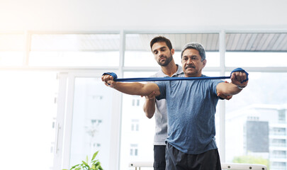 Physiotherapy, help and band with old man and doctor for training, rehabilitation and injury....