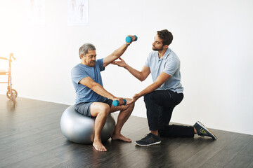 Weights, physiotherapy and help with doctor and old man for rehabilitation, training or stretching....