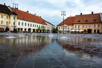 Medieval street with historical buildings in the heart of Romania. Sibiu the eastern European citadel city. Travel in Europe