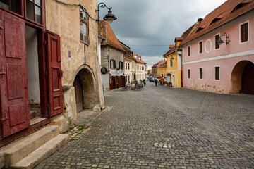 Medieval street with historical buildings in the heart of Romania. Sibiu the eastern European citadel city. Travel in Europe