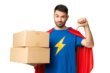 Super Hero delivery caucasian man over isolated chroma key background showing thumb down with...