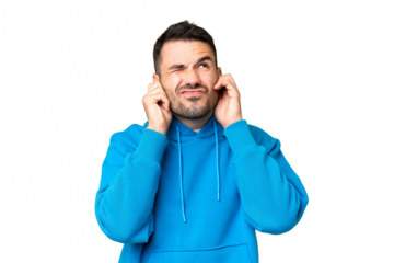 Young handsome caucasian man over isolated chroma key background frustrated and covering ears