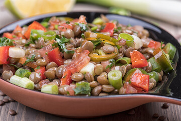 Lentil salad with veggies, healthy food, vegetarian and vegan snack, clean eating, diet, detox. Vegetables and cooking background