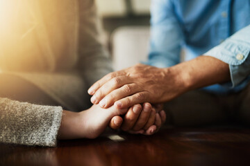 Holding hands, senior couple and life insurance support with kindness in a house. Home, love and elderly people with empathy, hope and trust with solidarity for grief care and marriage together - Powered by Adobe