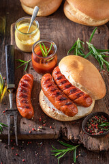 Spicy grilled sausage with bun made of pork.