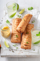 Hot and homemade hot dogs with ketchup and mustard.