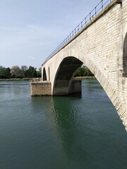 Fototapeta na wymiar old bridge over the river - Rhône, Avignon, France