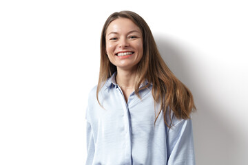 Young caucasian woman, professional entrepreneur standing in office clothing, smiling and looking confident on white background