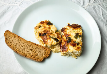 Hake Cake. Baked dish with cream, cheese, egg and hake