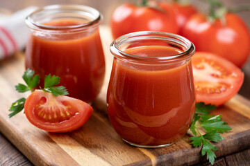 Tomato juice with fresh tomatoes and parsley