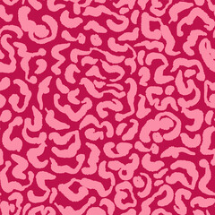 Pink wild safari animal seamless repeat pattern. Random placed, abstract vector shapes all over surface print.