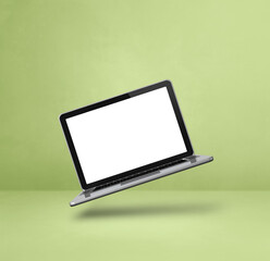 Floating computer laptop isolated on green. Square background