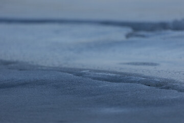 Fototapeta na wymiar Frozen Serenity: Winter's Icy Embrace on the River in Northern Europe