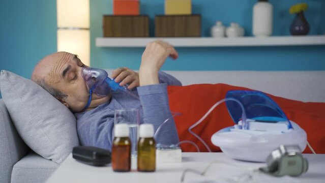 Sick bedridden man on respirator.