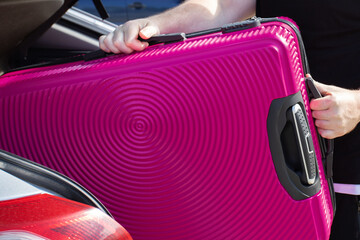 Road trip, Packing for travel, man putting suitcase in car trunk, car travel