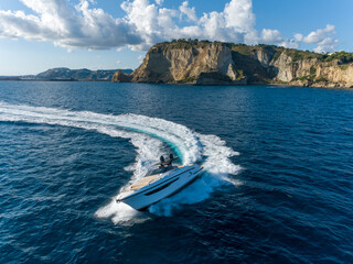 Aerial view of a luxury yacht in the mediterranean sea. napoli coast - 604352783