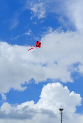 kite in the sky, red kite, cloudy blue sky, red kite in the blue sky