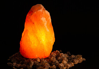 Crystal Emitting Light On A Dark Background