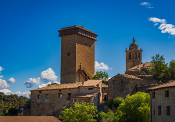 Fototapeta na wymiar The Castle of Abizanda or Torre de Abizanda is located in the Aragonese town of the same name, belonging to the region of Sobrarbe, in the province of Huesca. The tower is prominently visible from the