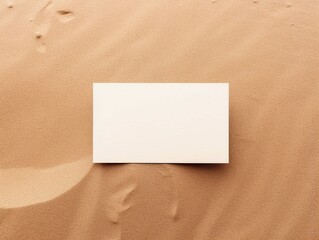 Blank card mockup on sand background. Top view flat lay. Minimal design, Boho style