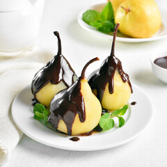 Poached pears with chocolate sauce